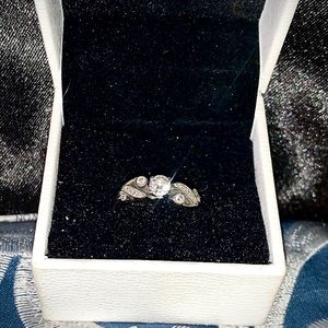 One-of-a-kind diamond & white gold ring. Size 7.